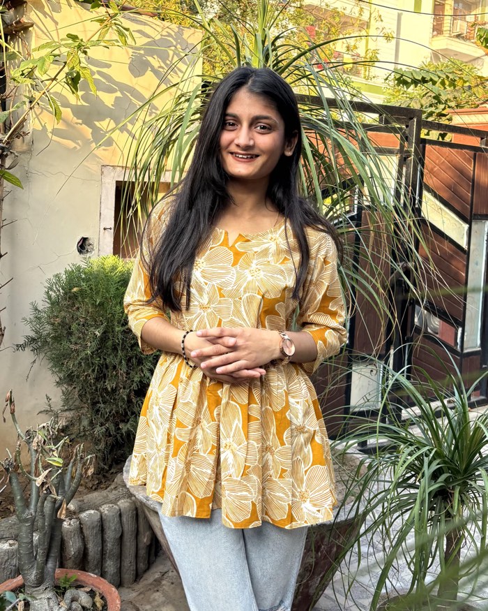 Komal, co-founder, wearing one of the kurtis